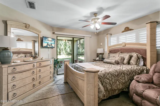 a bathroom with a sink vanity and a mirror