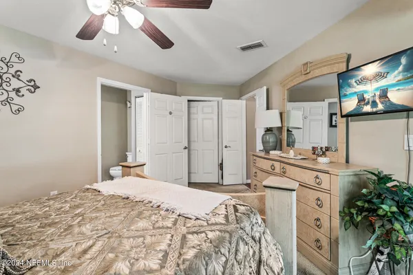 a room with a table and chairs