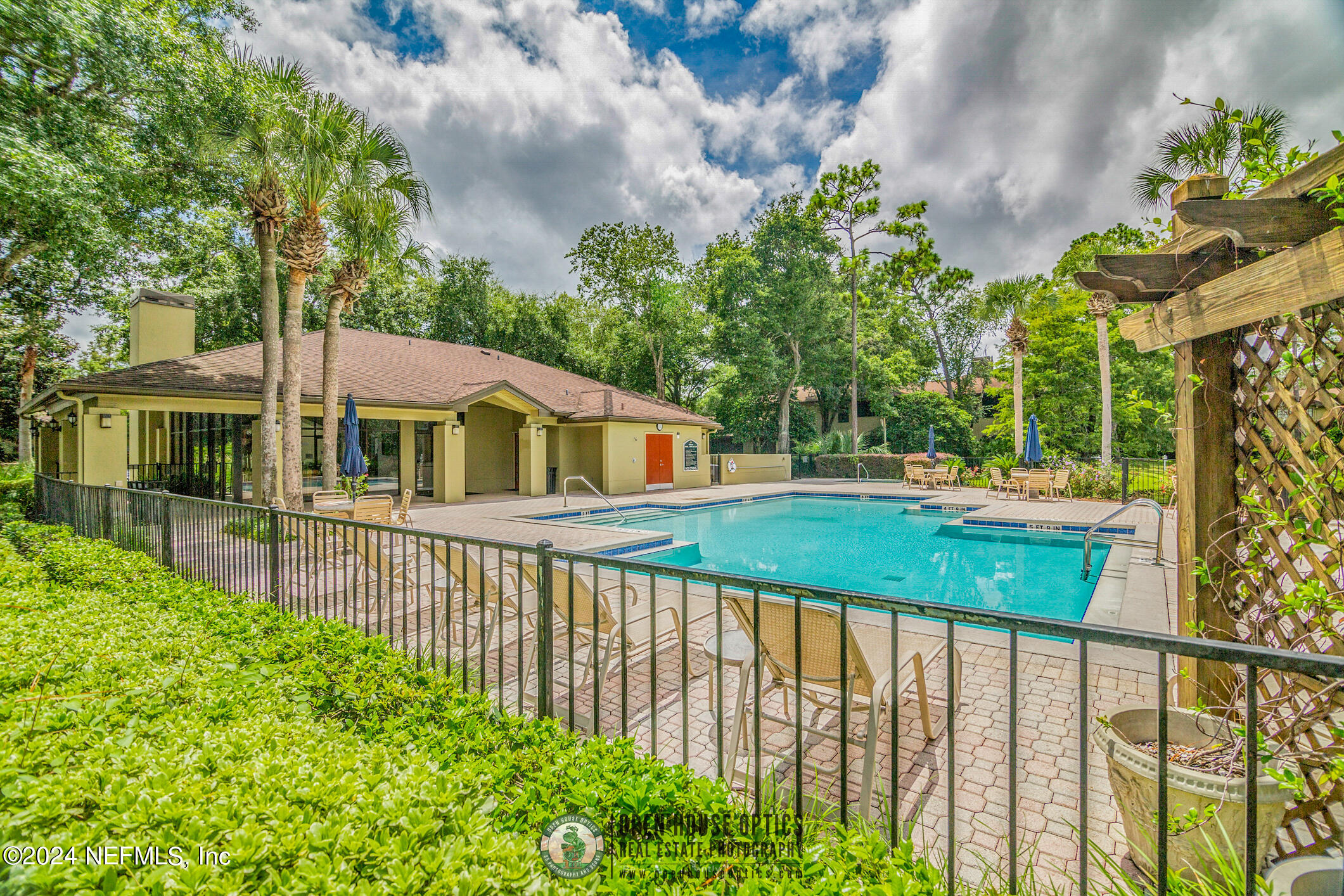10150 Belle Rive Boulevard, Unit 2605 Jacksonville, FL 32256 - Photo 42 of 52 a front view of a house with a yard