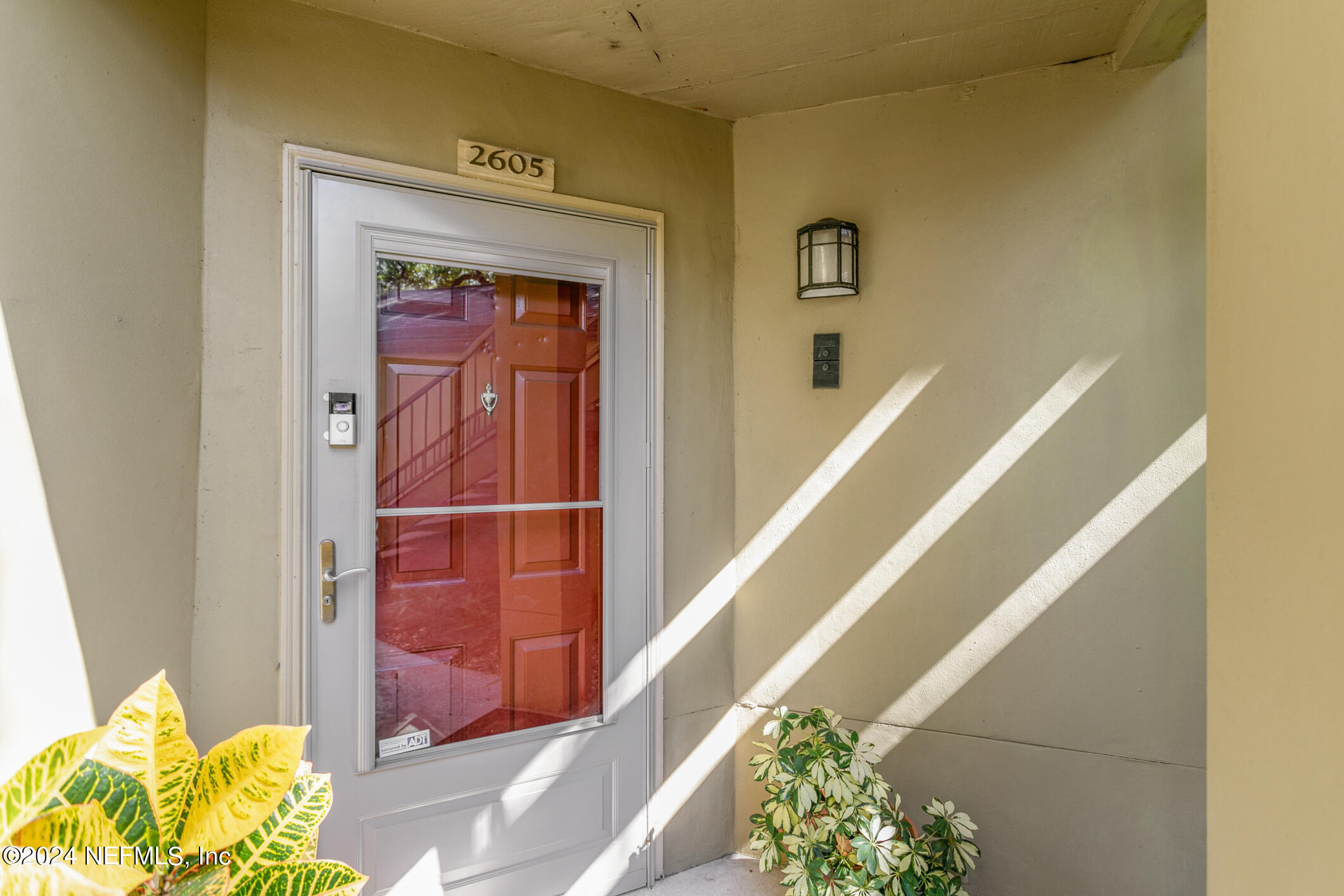 10150 Belle Rive Boulevard, Unit 2605 Jacksonville, FL 32256 - Photo 5 of 52 Front Door w/Added Storm Door