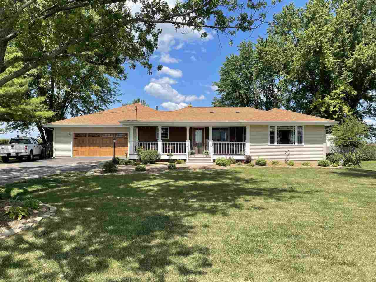 9474 Marengo Road Garden Prairie, IL 61038 - Photo 1 of 31 a front view of a house with a garden