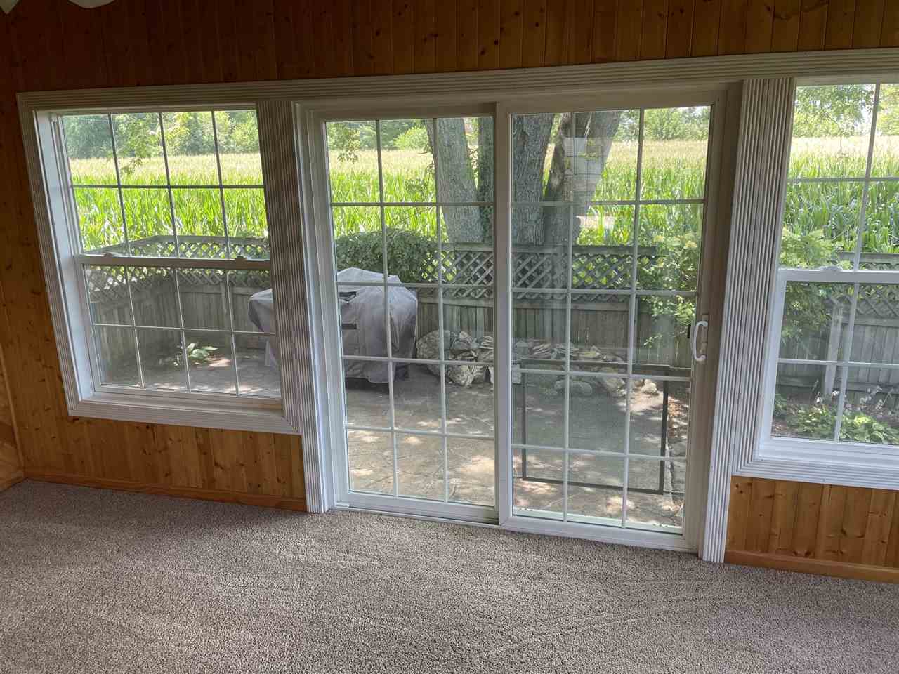 9474 Marengo Road Garden Prairie, IL 61038 - Photo 13 of 31 a view of an empty room with a balcony