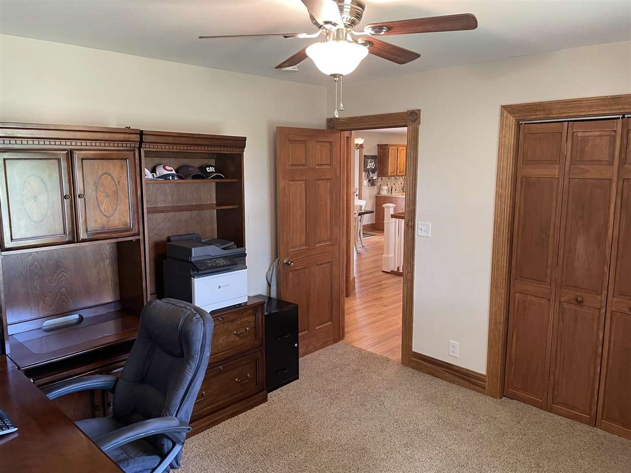 9474 Marengo Road Garden Prairie, IL 61038 - Photo 22 of 31 a view of a livingroom with workspace and a window