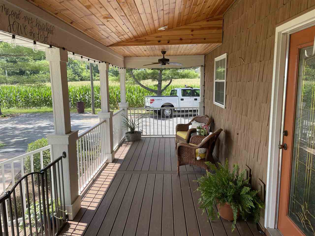 9474 Marengo Road Garden Prairie, IL 61038 - Photo 4 of 31 a view of a balcony with furniture