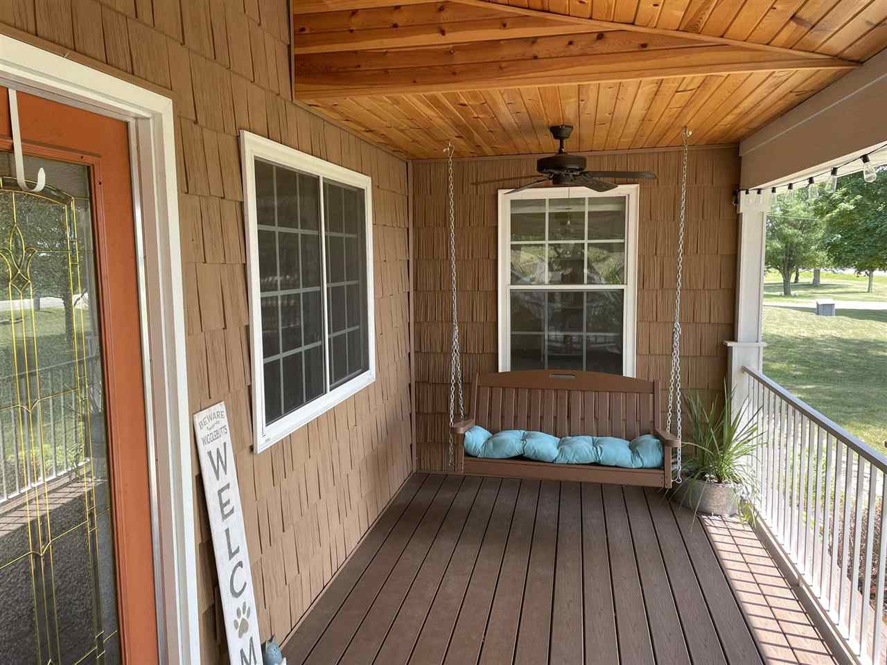 9474 Marengo Road Garden Prairie, IL 61038 - Photo 5 of 31 a view of a balcony with wooden floor