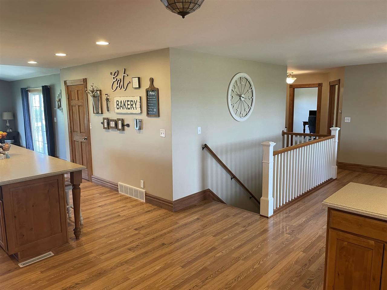 9474 Marengo Road Garden Prairie, IL 61038 - Photo 7 of 31 a view of a hallway with wooden floor