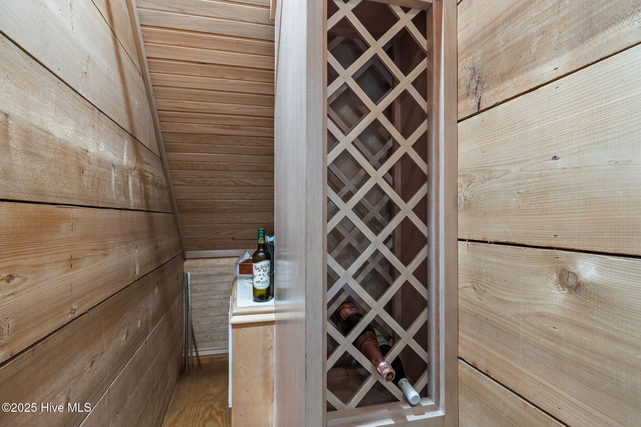 1207 Timber Trail Emerald Isle, NC 28594 - Photo 21 of 63 Cedar lined wine closet