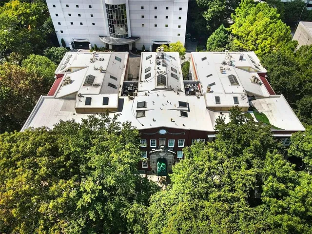 an aerial view of a multi story building