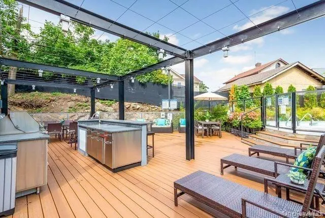a view of a swimming pool with a lounge chairs