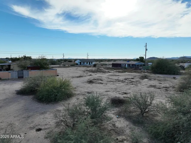 a view of a lake with lots of green space