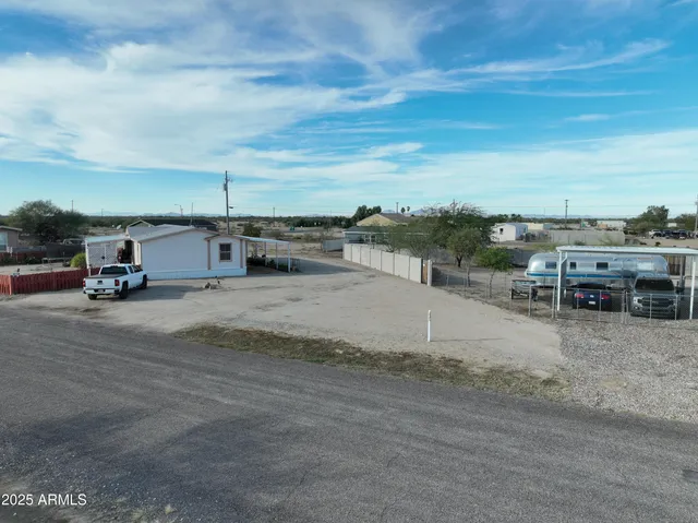 a view of a terrace with a big yard