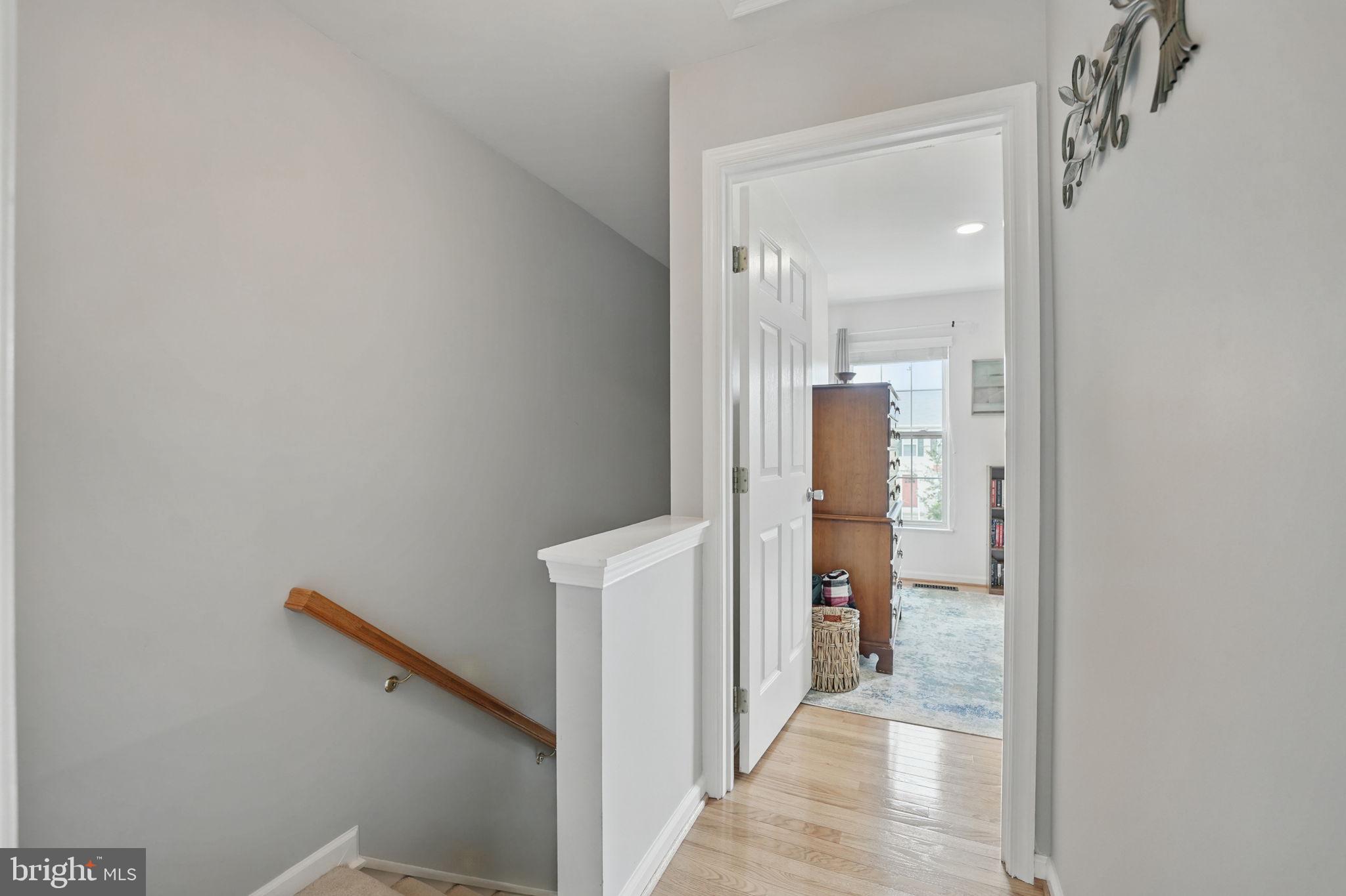6383 Michael Robert Drive Springfield, VA 22150 - Photo 18 of 29 a view of a bathroom from a hallway