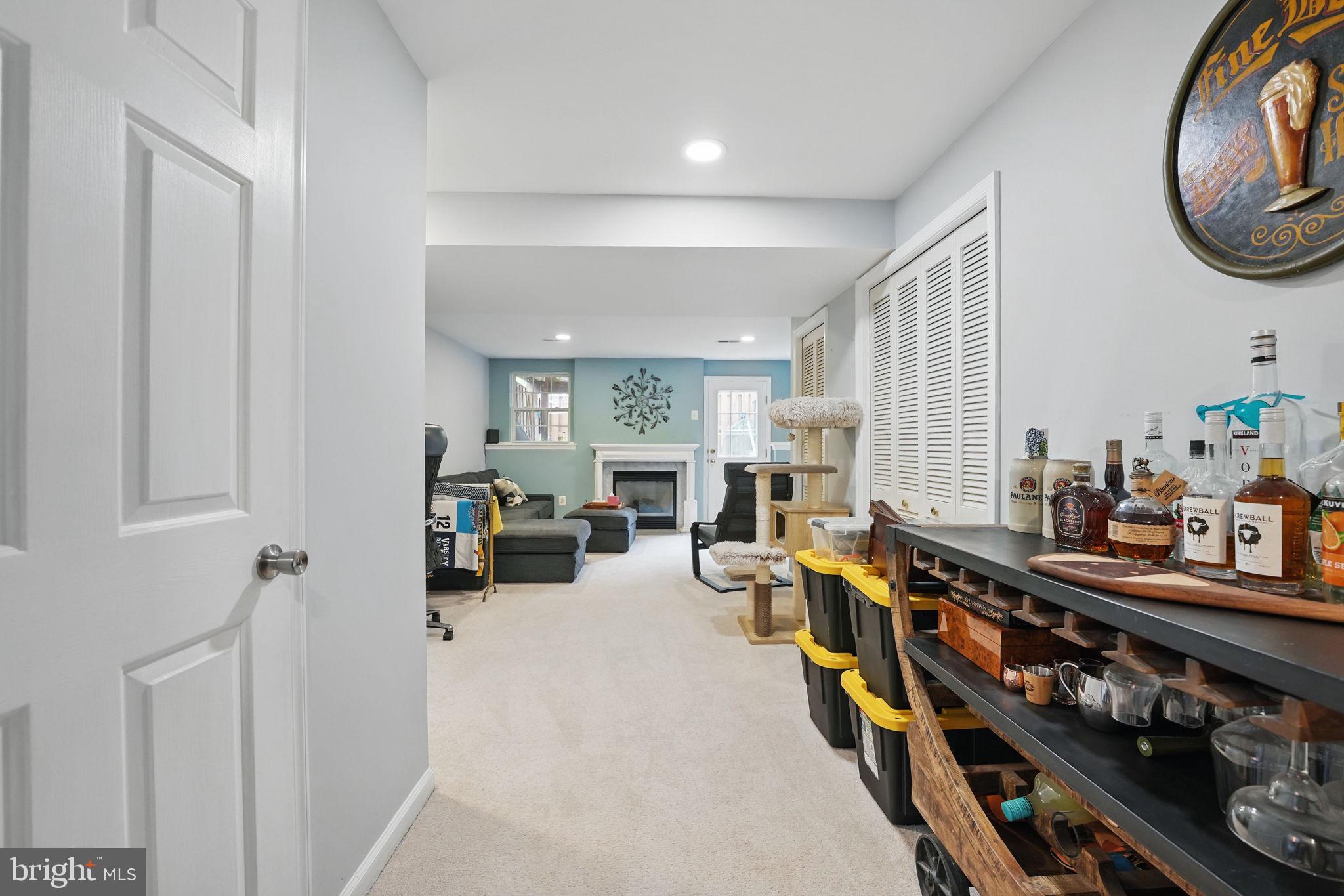 6383 Michael Robert Drive Springfield, VA 22150 - Photo 20 of 29 a living room with furniture and a flat tv screen