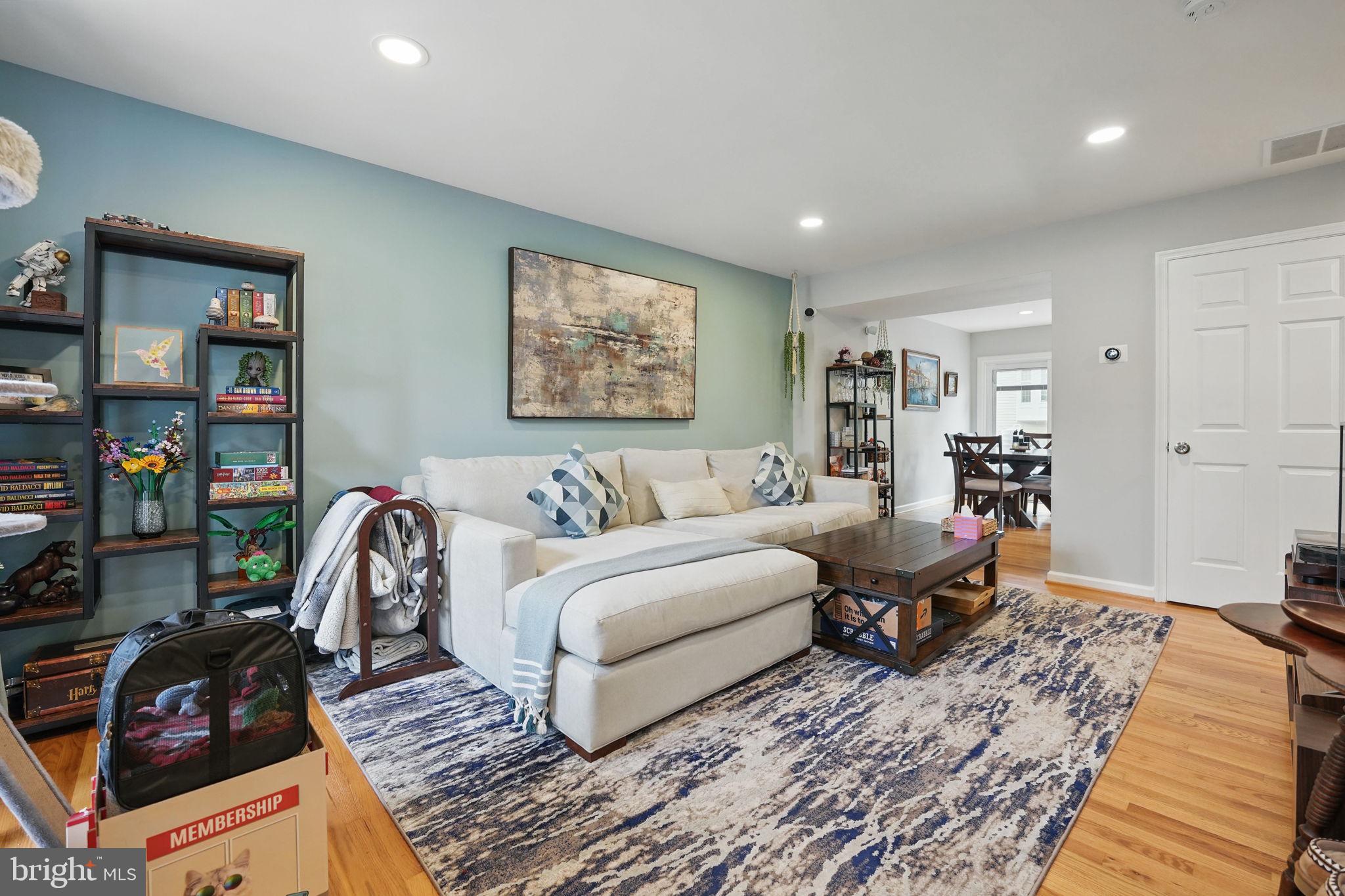 6383 Michael Robert Drive Springfield, VA 22150 - Photo 2 of 29 a living room with furniture and a couch