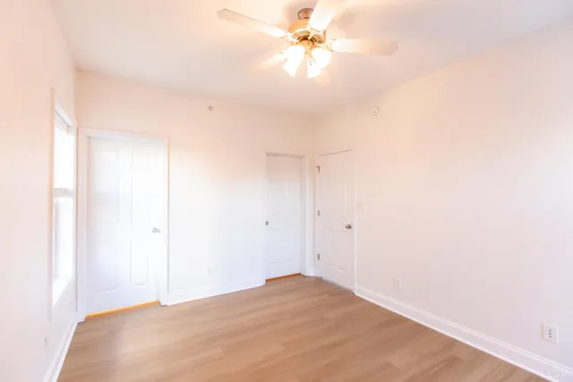 a view of a big room with carpet