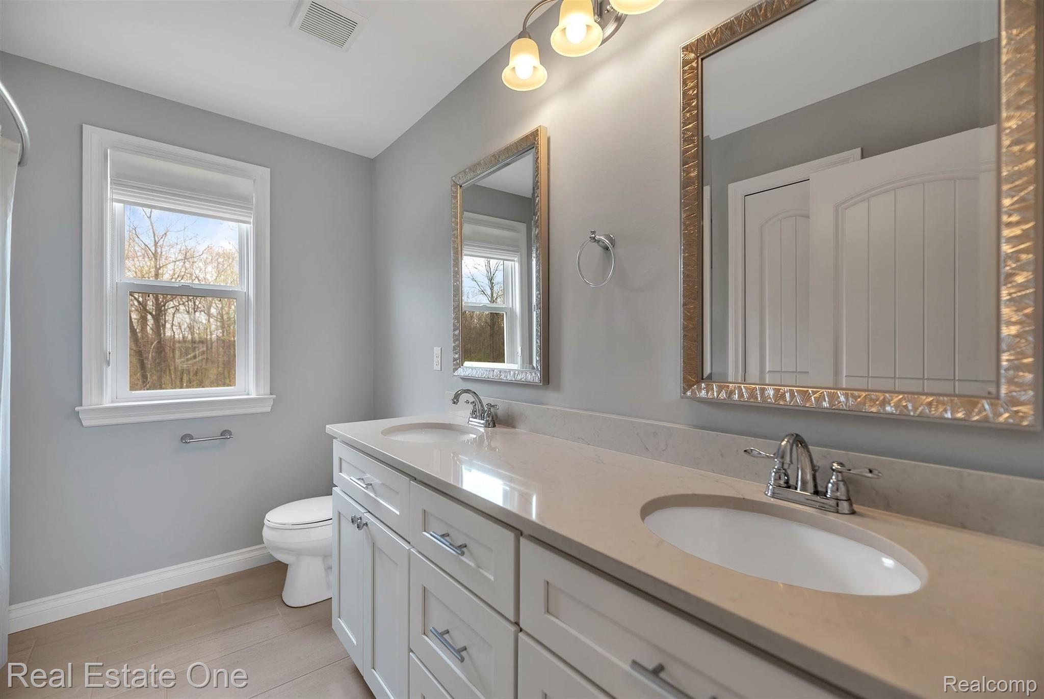 2452 Walnut View Drive Howell, MI 48855 - Photo 25 of 39 30-2452 Walnut View Dr-WindowStill-Real-Estate-Photography-30.jpg