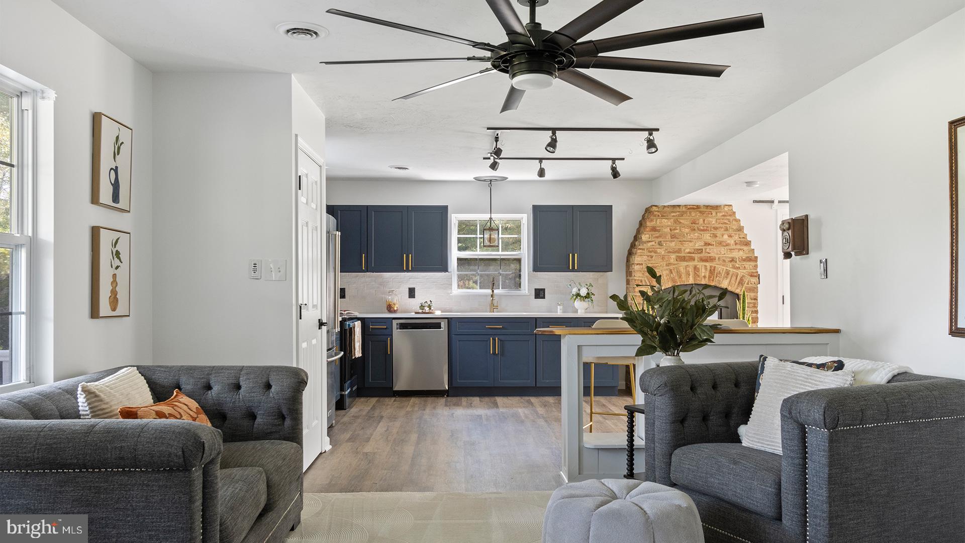 739 Company Farm Road Aspers, PA 17304 - Photo 10 of 45 a living room with furniture and a large window