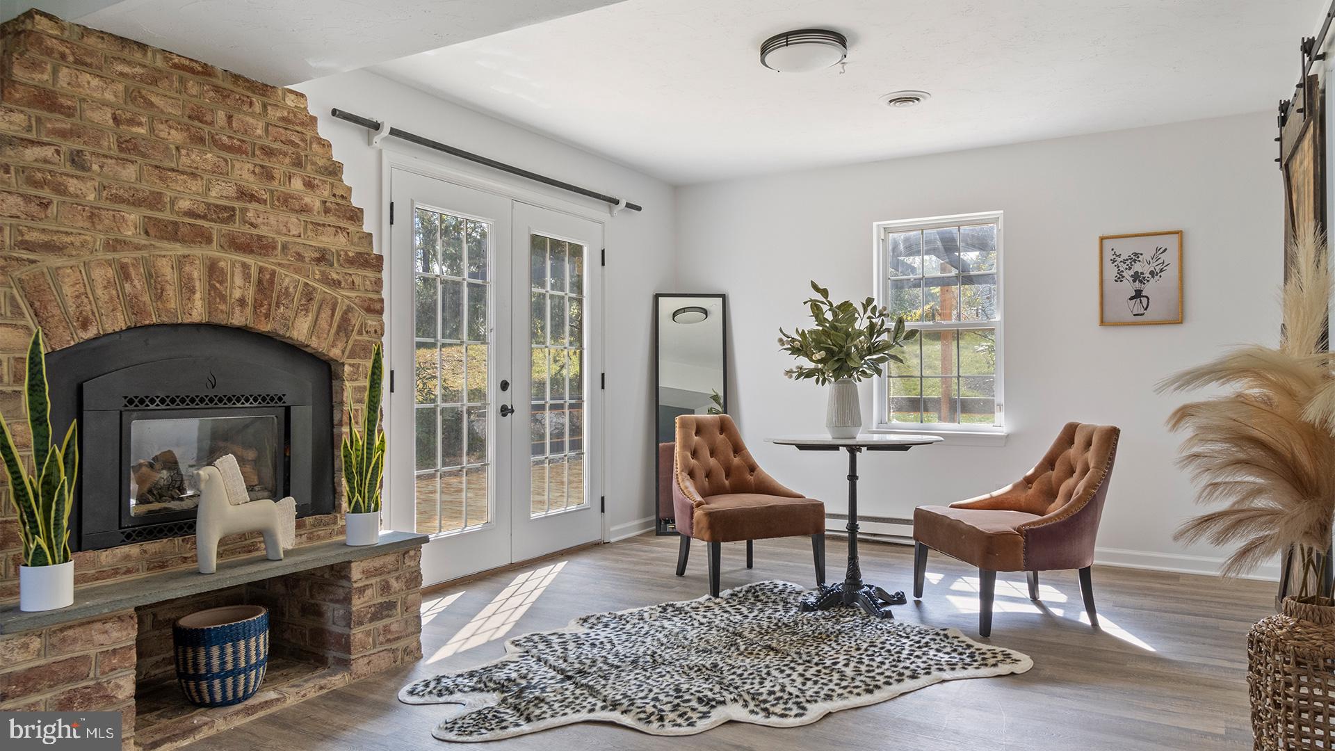 739 Company Farm Road Aspers, PA 17304 - Photo 16 of 45 a living room with furniture and a fireplace