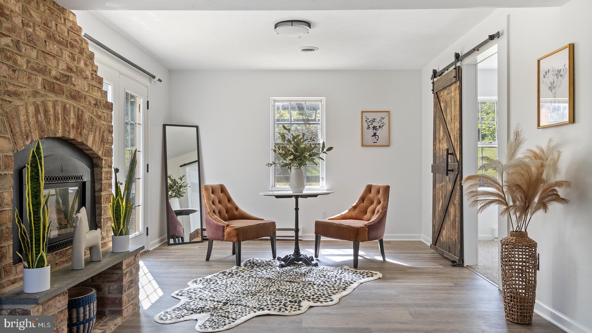 739 Company Farm Road Aspers, PA 17304 - Photo 17 of 45 a living room with furniture and a potted plant