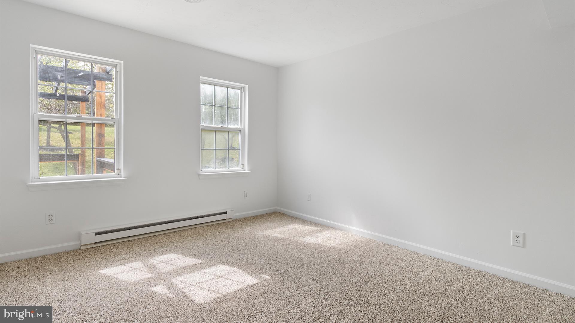 739 Company Farm Road Aspers, PA 17304 - Photo 18 of 45 an empty room with windows
