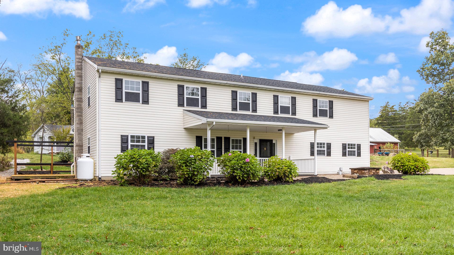 739 Company Farm Road Aspers, PA 17304 - Photo 2 of 45 a front view of a house with a garden
