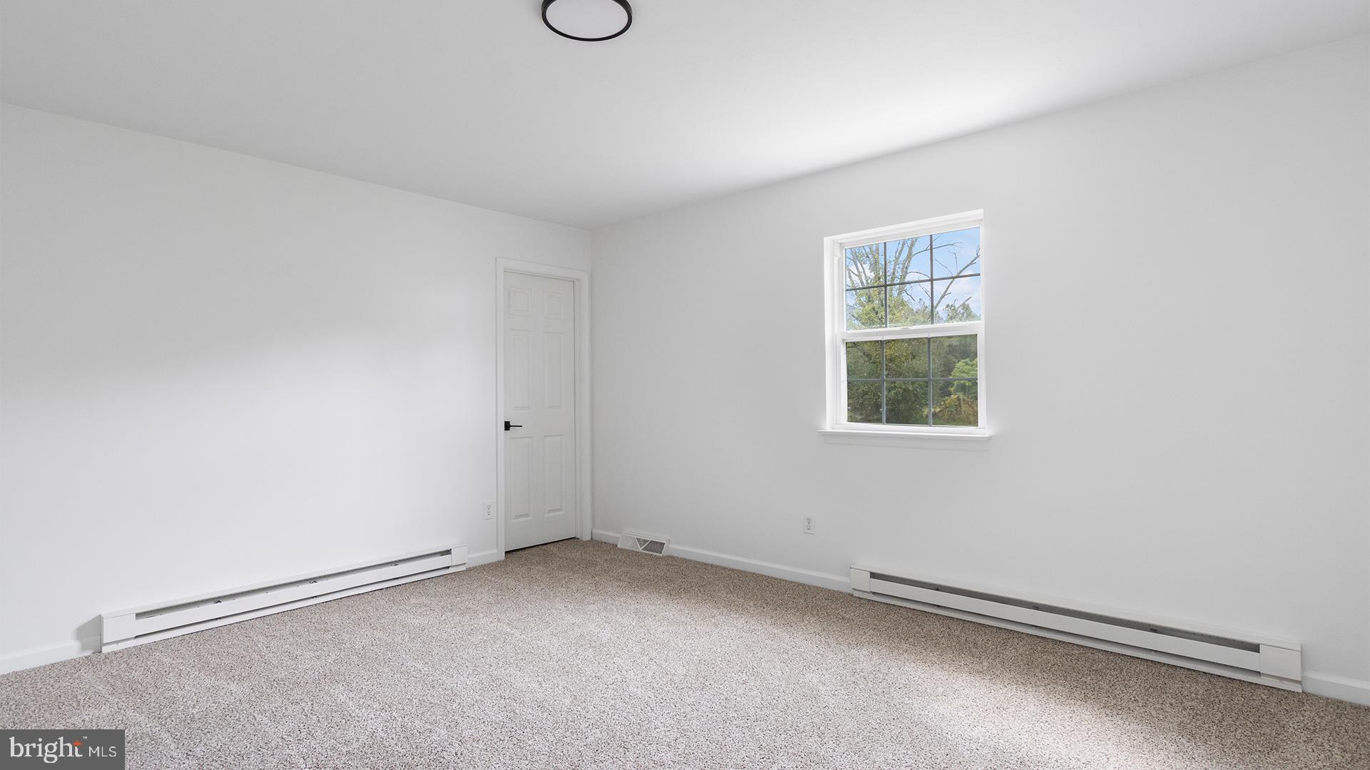 739 Company Farm Road Aspers, PA 17304 - Photo 29 of 45 an empty room with a window