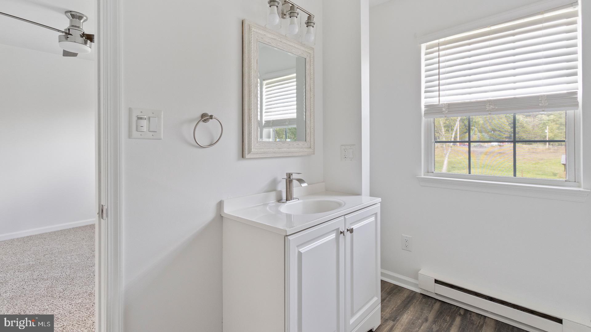 739 Company Farm Road Aspers, PA 17304 - Photo 39 of 45 a bathroom with a sink and a mirror