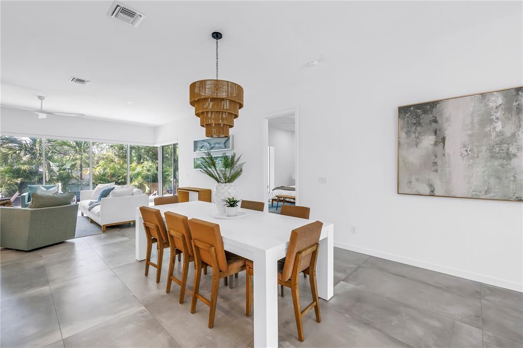 2314 Floyd Street Sarasota, FL 34239 - Photo 11 of 90 a view of a dining room with furniture window and wooden floor