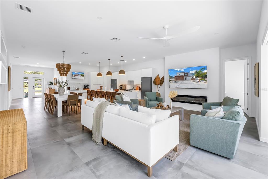 2314 Floyd Street Sarasota, FL 34239 - Photo 19 of 90 a living room with furniture and a flat screen tv