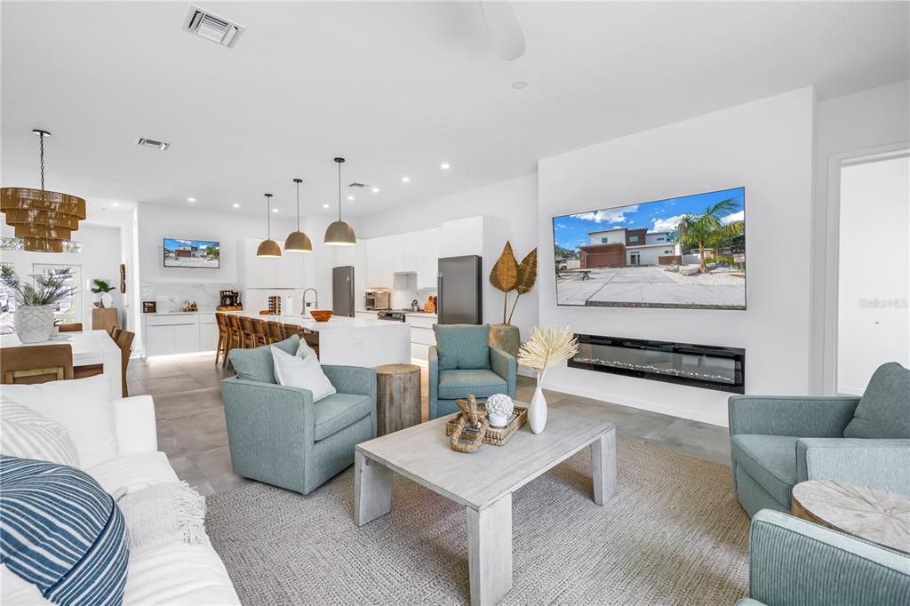 2314 Floyd Street Sarasota, FL 34239 - Photo 20 of 90 a living room with furniture and a flat screen tv