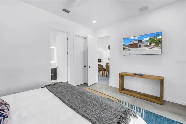 a bathroom with a bathtub and shower