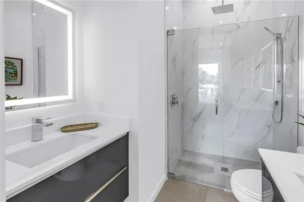 a view of a bench in a back yard