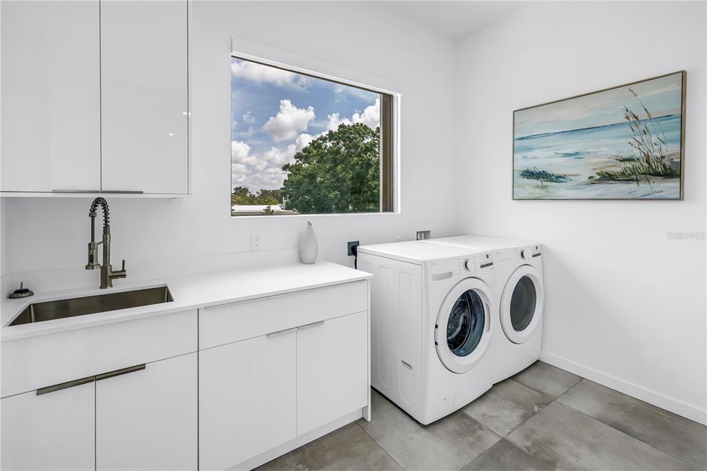 2314 Floyd Street Sarasota, FL 34239 - Photo 55 of 90 a utility room with dryer and washer
