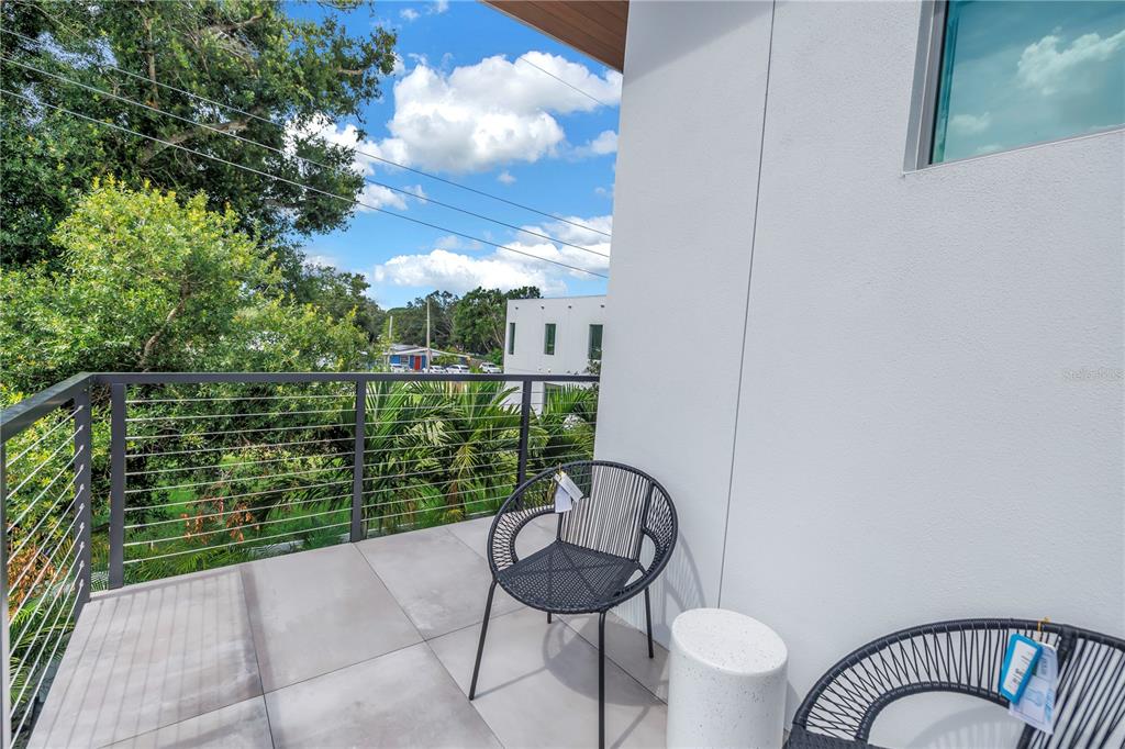2314 Floyd Street Sarasota, FL 34239 - Photo 60 of 90 a view of a chair and table in the balcony