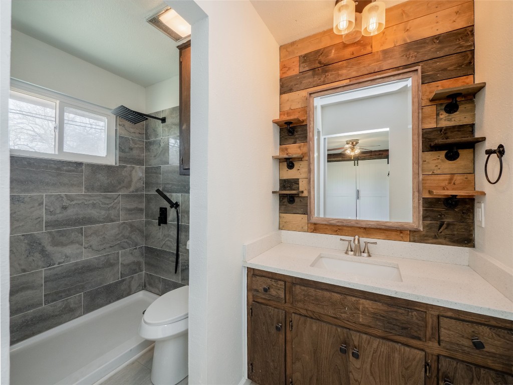 3209 Buffalo Springs Trail Georgetown, TX 78628 - Photo 15 of 32 a bathroom with a sink a toilet and shower