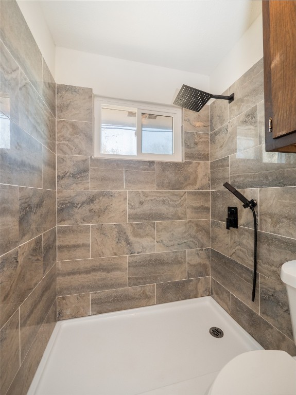 3209 Buffalo Springs Trail Georgetown, TX 78628 - Photo 16 of 32 a bathroom with a bathtub and a shower