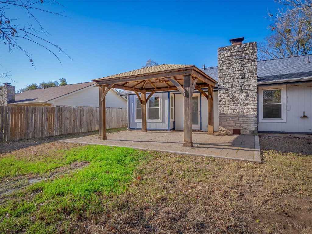 3209 Buffalo Springs Trail Georgetown, TX 78628 - Photo 27 of 32 a view of a house with a yard