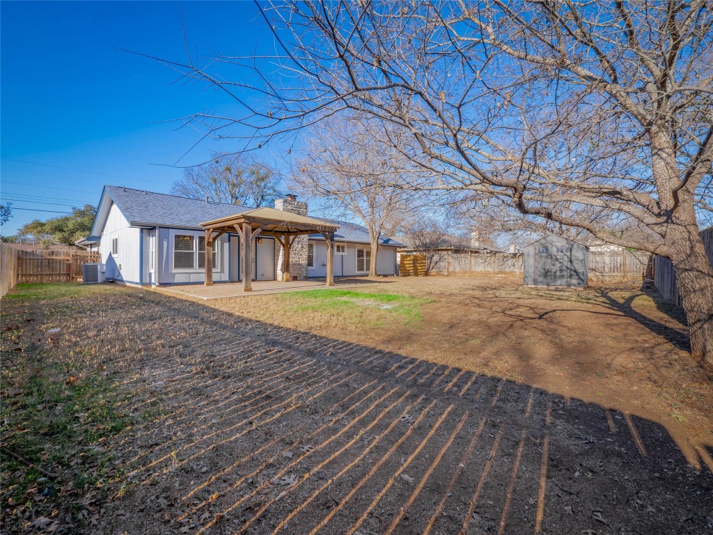 3209 Buffalo Springs Trail Georgetown, TX 78628 - Photo 28 of 32 a view of house with yard