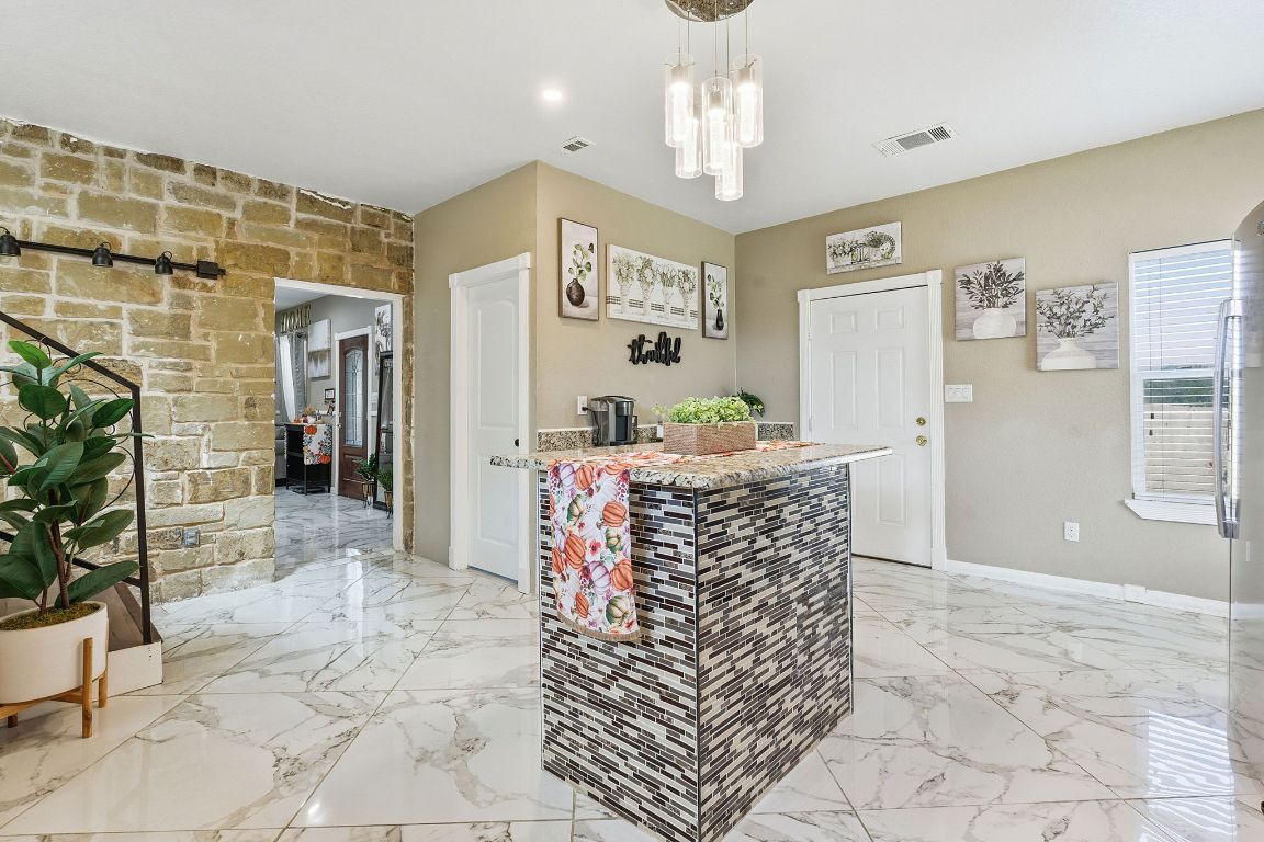 169 Ridgetop Road Buda, TX 78610 - Photo 7 of 40 a view of hall way with furniture