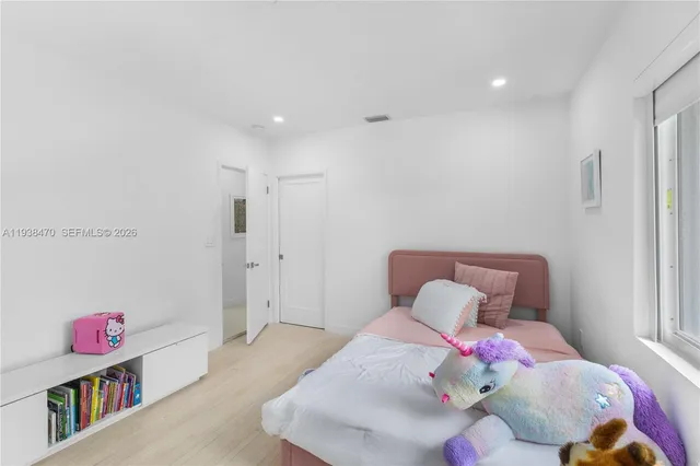 a bedroom with furniture and a couch