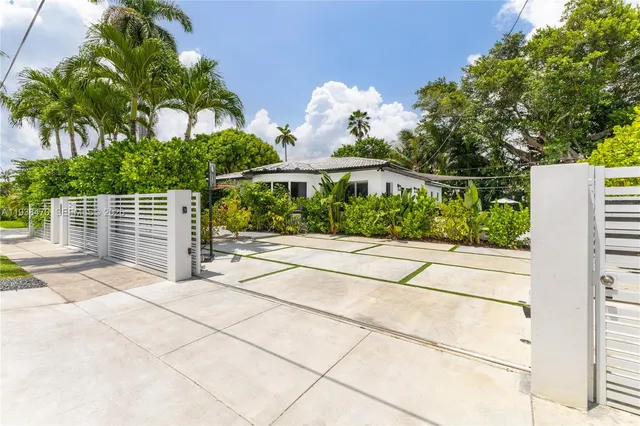 a house view with a garden space