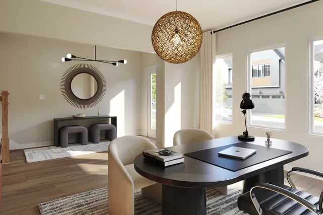 a living room with furniture a table and a large window