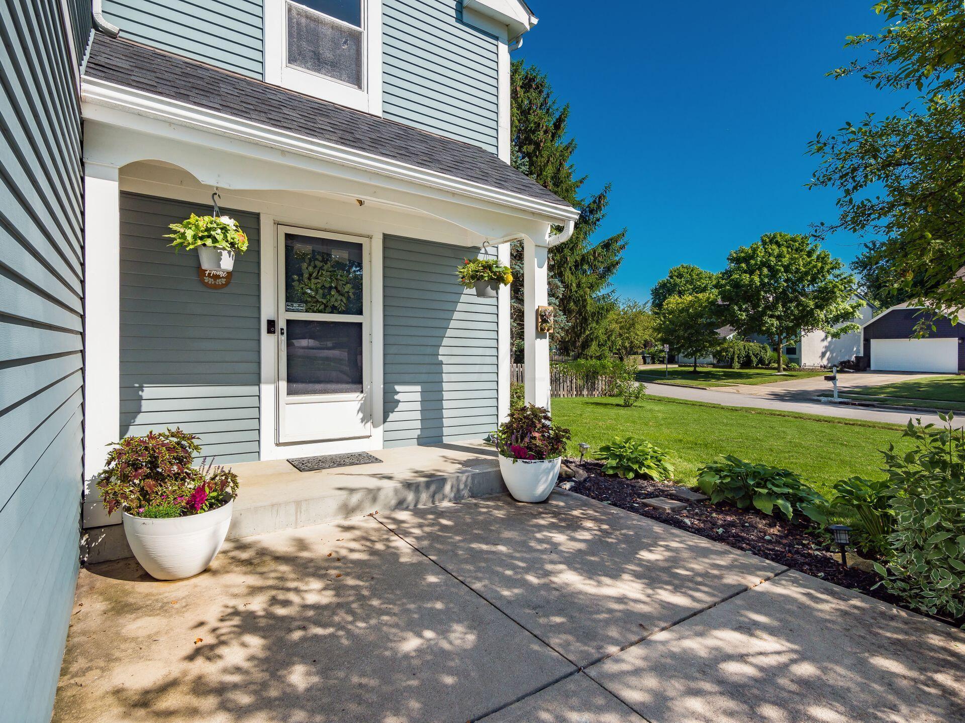 Covered front door/porch. Enough room for a table and chairs out front too.