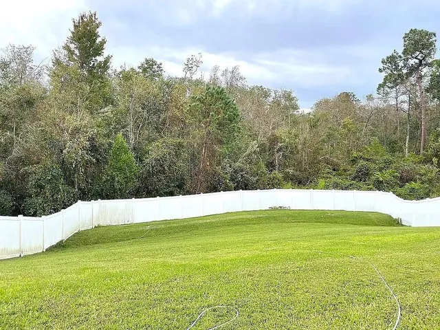 a view of an outdoor space with a lake view