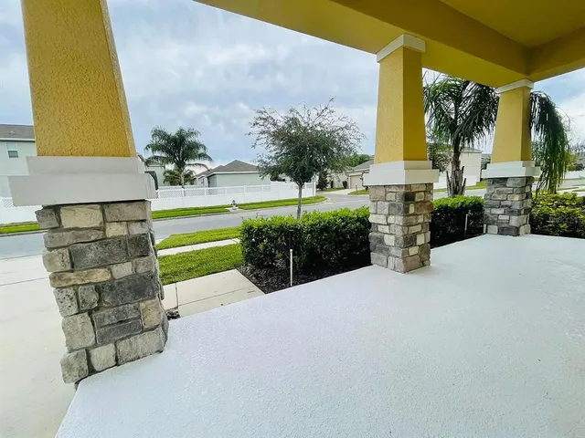 a view of house with outdoor space and porch