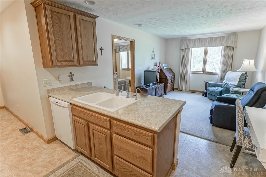 8464 Chambersburg Road Huber Heights, OH 45424 - Photo 38 of 44 In-law kitchen/living room view