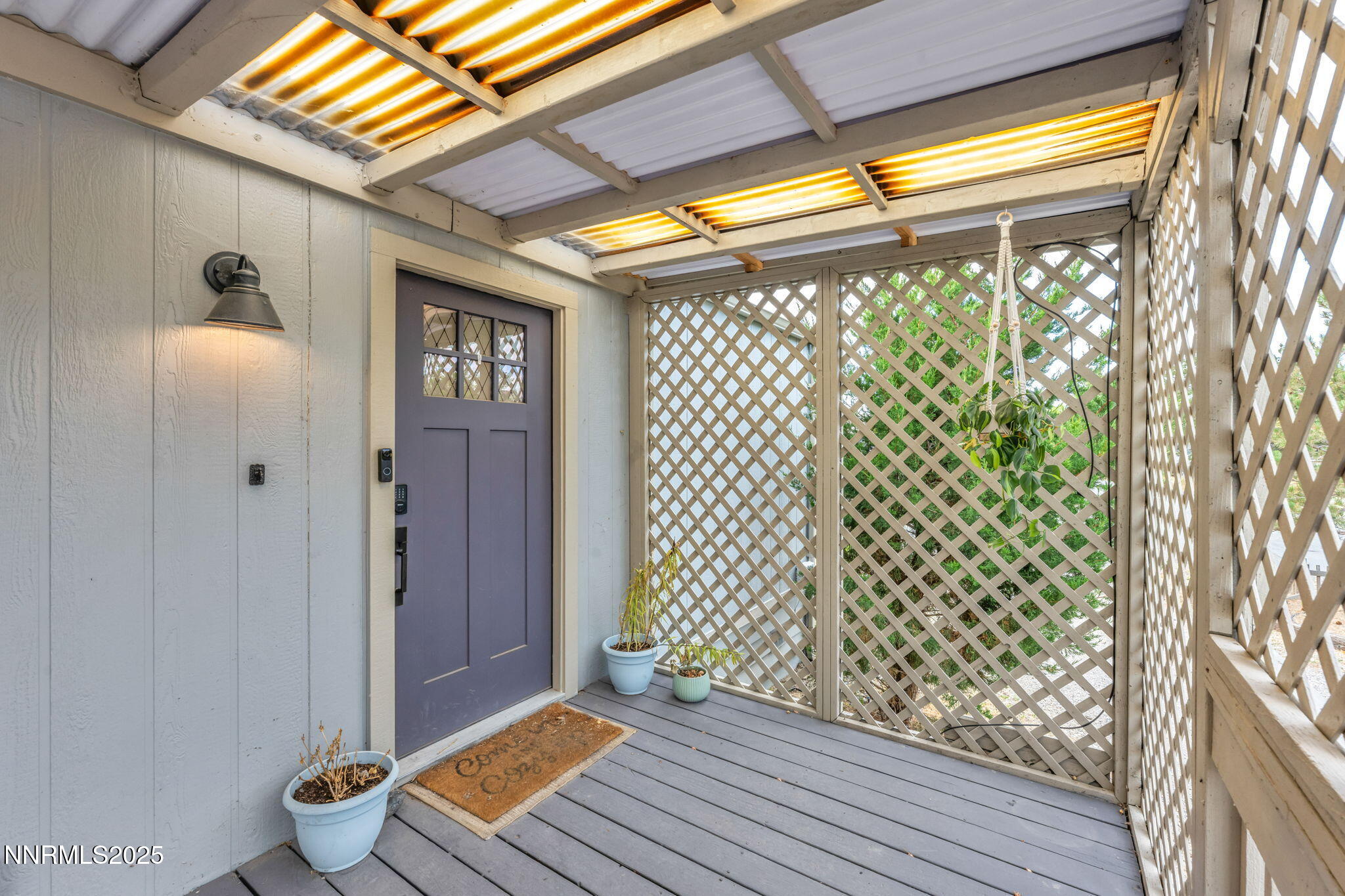 16260 Rhyolite Circle Reno, NV 89521 - Photo 2 of 18 a view of outdoor space with wooden floor and windows