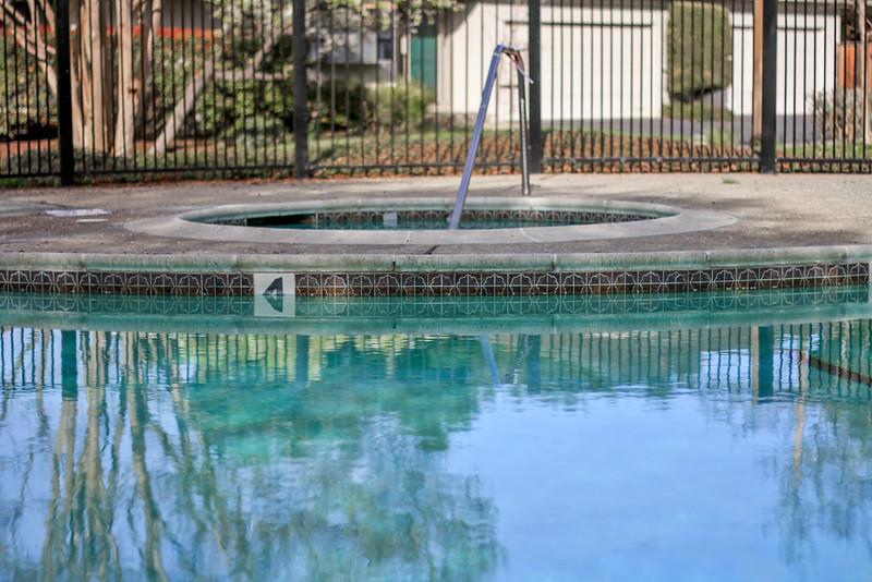 23030 Stonebridge Cupertino, CA 95014 - Photo 10 of 14 a backyard of a house with lake view