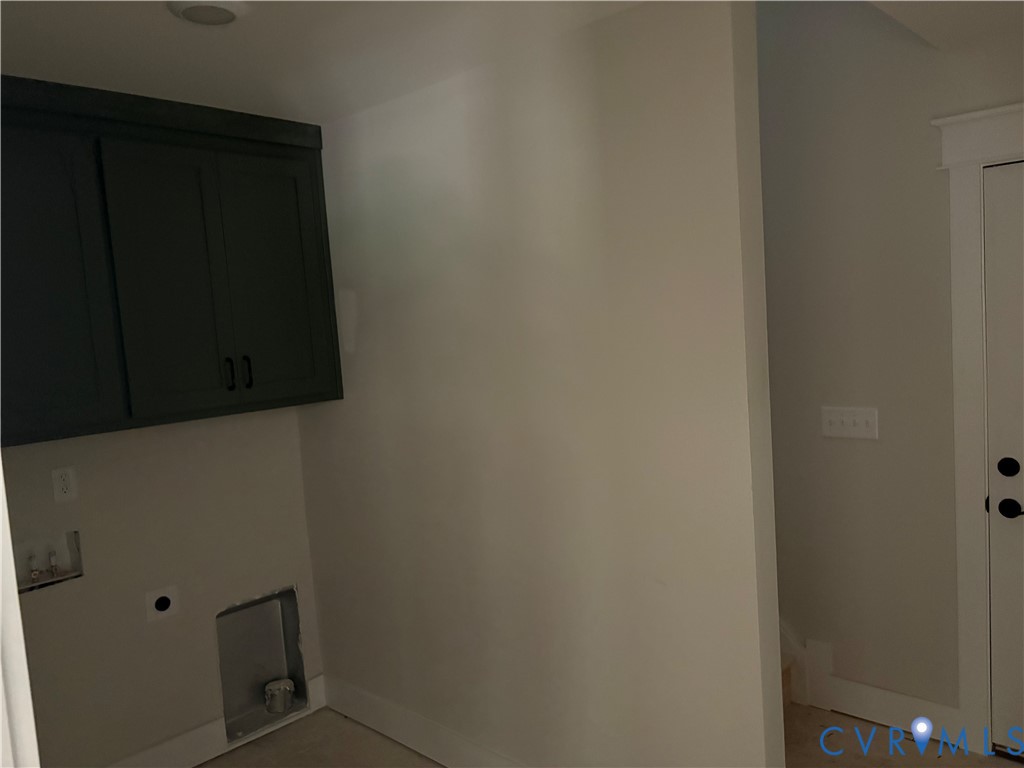 15135 Lebanon Road Spring Grove, VA 23881 - Photo 10 of 19 Built-in dark cabinetry with matte black hardware