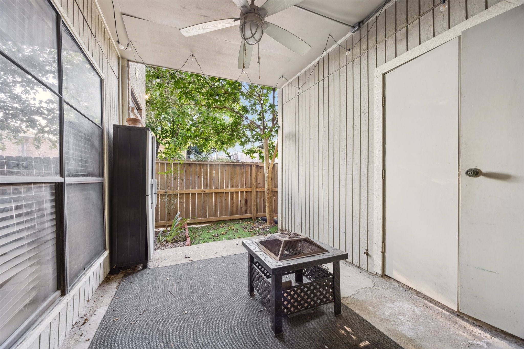 8100 Cambridge Street, Unit 123 Houston, TX 77054 - Photo 17 of 31 a backyard of a house with table and chairs